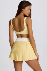 Soft Active Crossover Pleated Mini Skort in Lemon