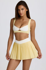 Soft Active Crossover Pleated Mini Skort in Lemon