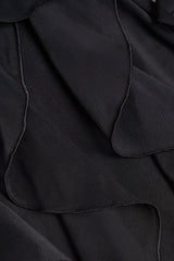 Ruffled Mid-Rise Flared Trousers in Black