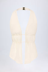 Cut-Out Semi-Sheer Ruched Halterneck Crop Top in Ivory