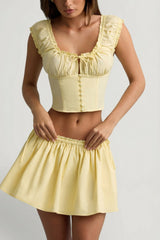 Ruched Cotton-Poplin Mini Skirt in Lemon Yellow