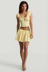 Ruched Cotton-Poplin Mini Skirt in Lemon Yellow