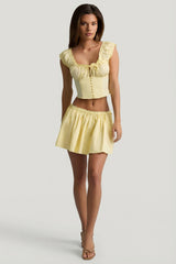 Ruched Cotton-Poplin Mini Skirt in Lemon Yellow