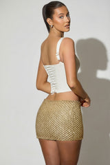 Embellished Low-Rise Mini Skirt in Gold