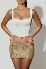 Embellished Low-Rise Mini Skirt in Gold