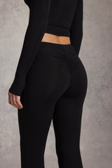 Modal Mid-Rise Flared Trousers in Black