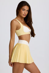 Soft Active Crossover Pleated Mini Skort in Lemon