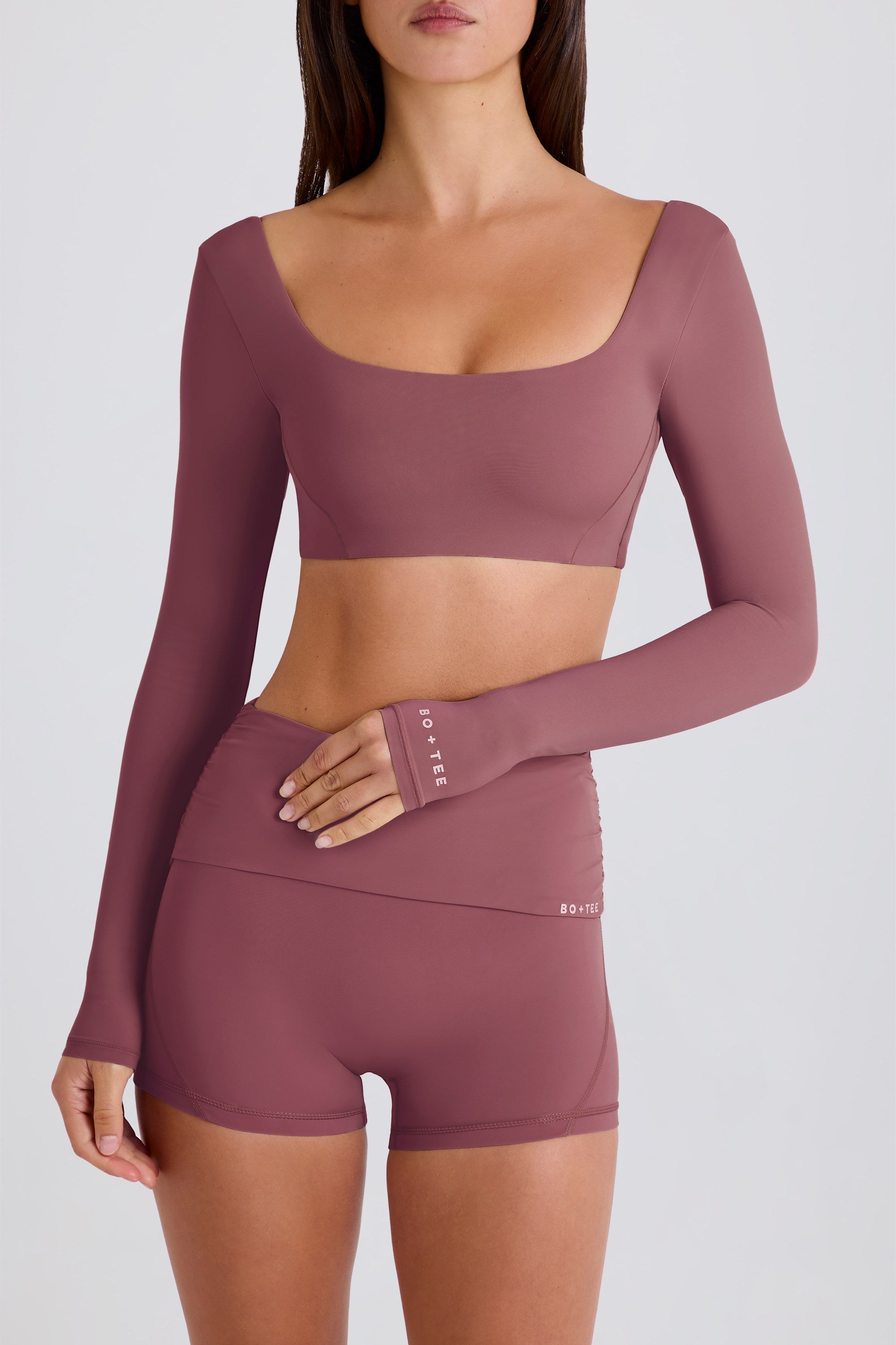 Four-Way Stretch Foldover Mid-Rise Mini Shorts in Acai